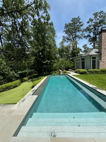 Blue crystal pool after Sundance pool pros made it swim ready for Houston area pool owner.